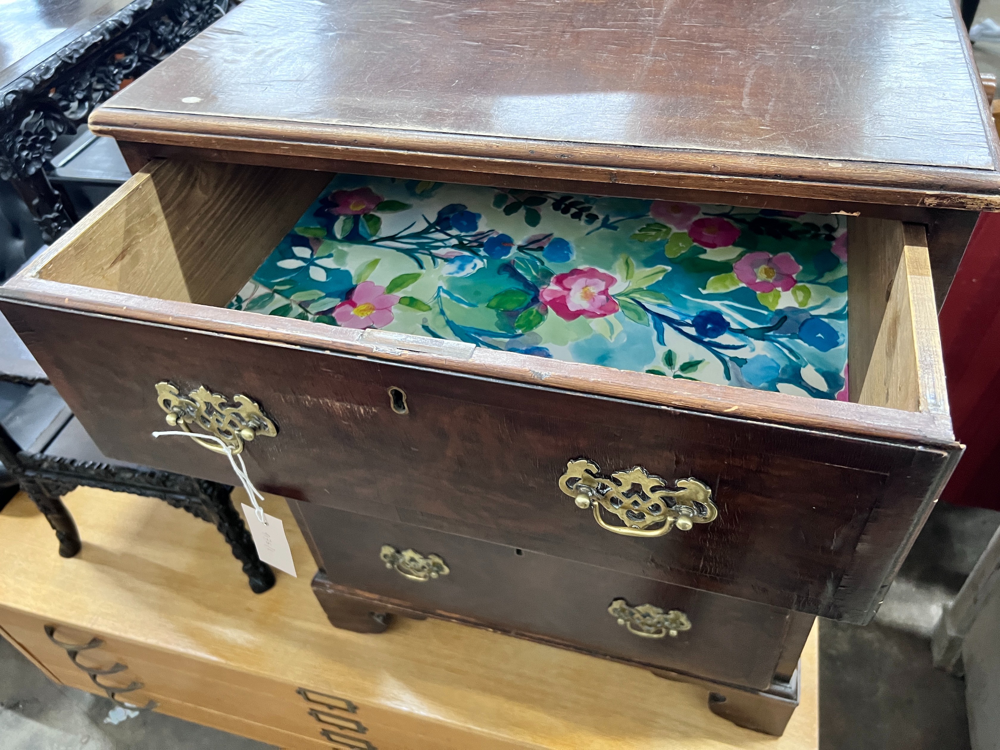An 18th century style walnut three drawer chest, width 60cm *Please note the sale commences at 9am.